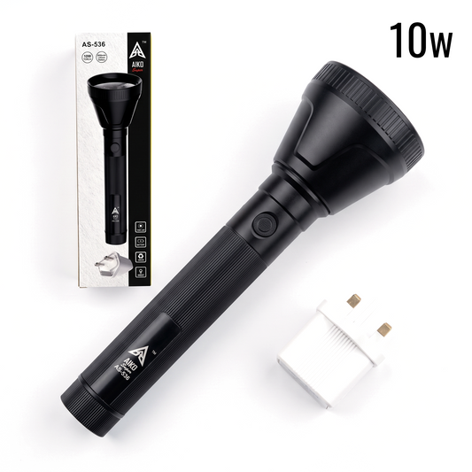 A black handheld flashlight shown diagonally on a white background, alongside its retail box and a small white power adapter. The flashlight has a textured grip, a ribbed head, and visible branding that reads A2S.