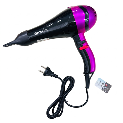 A hair dryer with a glossy black body and vibrant purple accents on the nozzle and handle, shown with its black power cord and a small product tag on a plain white background.