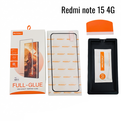 MOSSILY full-glue tempered glass screen protector kit for Redmi Note 15 4G, showing the retail box, the screen protector with protective film, an orange squeegee, and a black tray with a cleaning cloth on a white background.